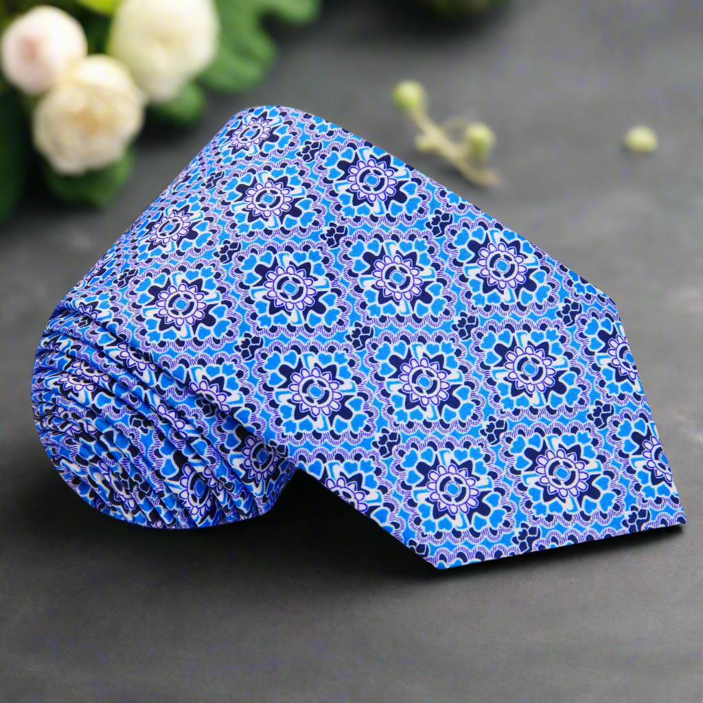 Front view of the blue mosaic geometric tie featuring intricate pattern for professional attire
