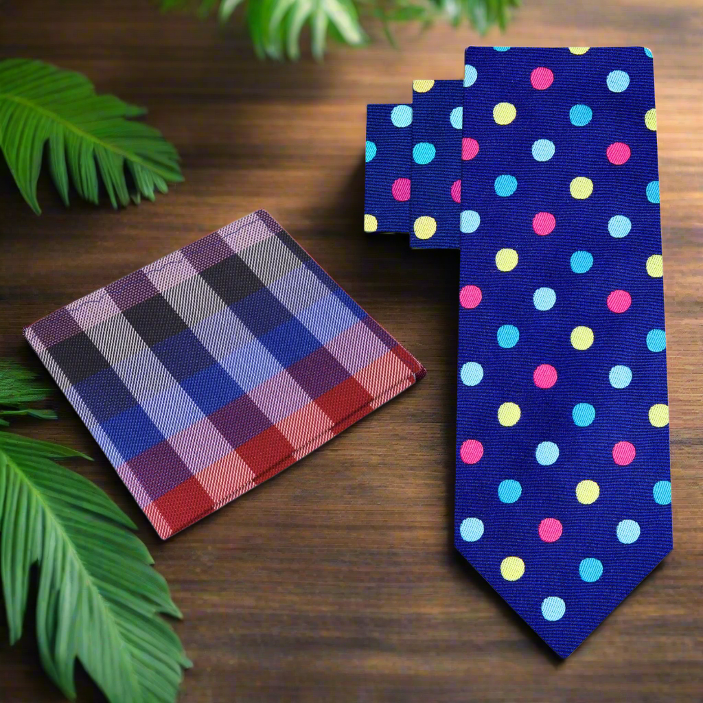 Stylish display of the polka dot silk necktie on a light grey suit, ideal for business meetings.