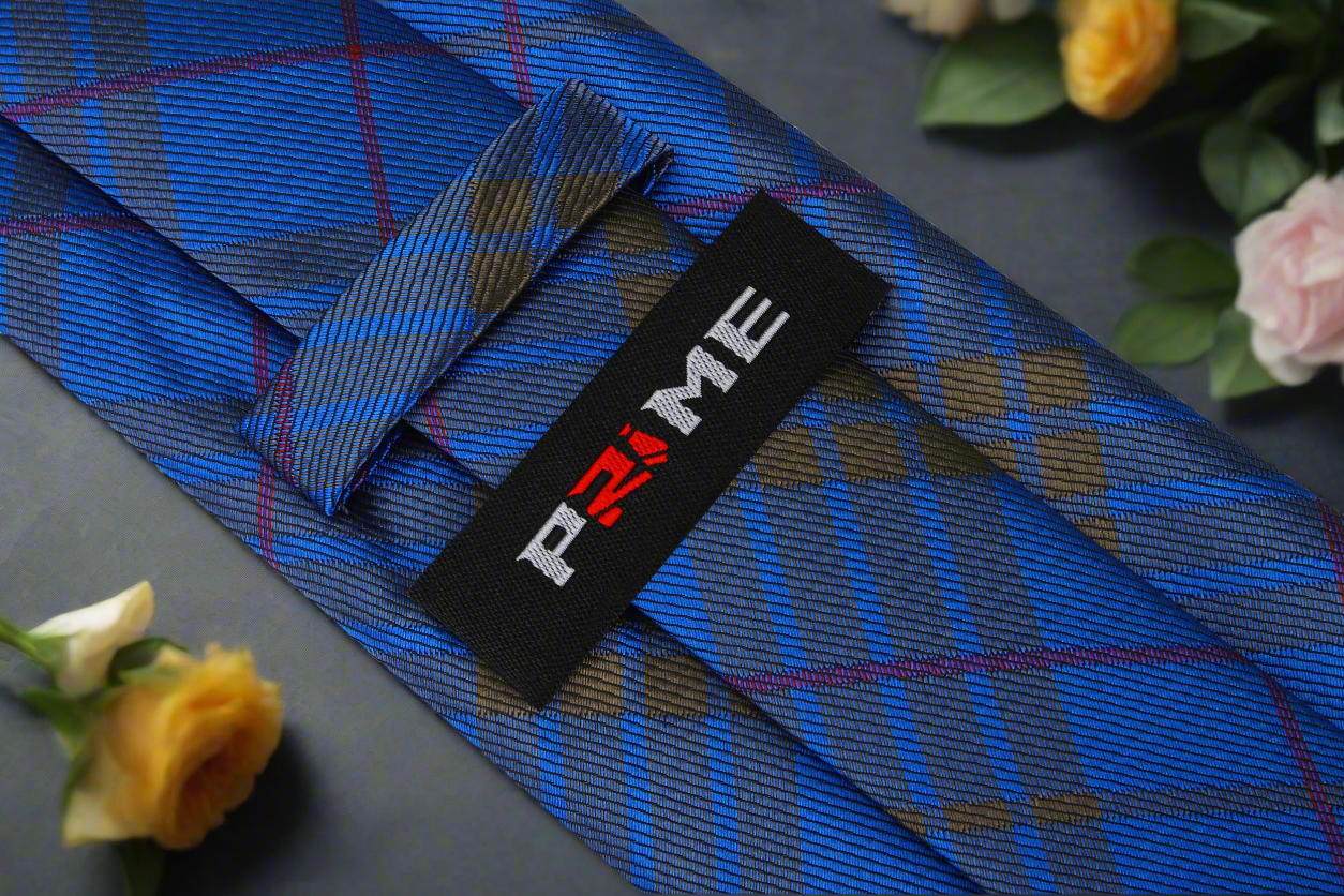 Detail shot of the tie paired with a light grey shirt, highlighting its versatility.
