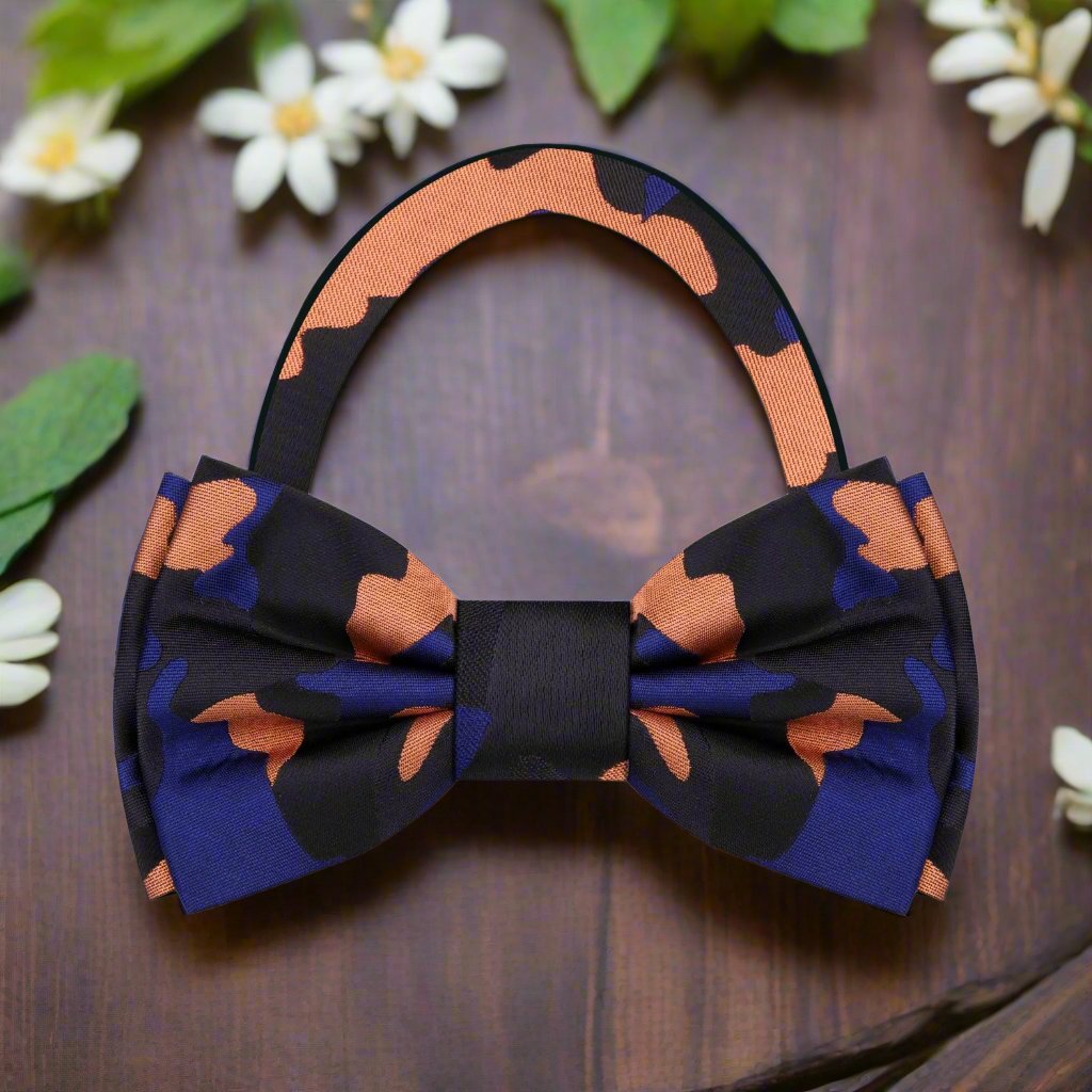 Casual outfit featuring camouflage bow tie paired with a dark blazer