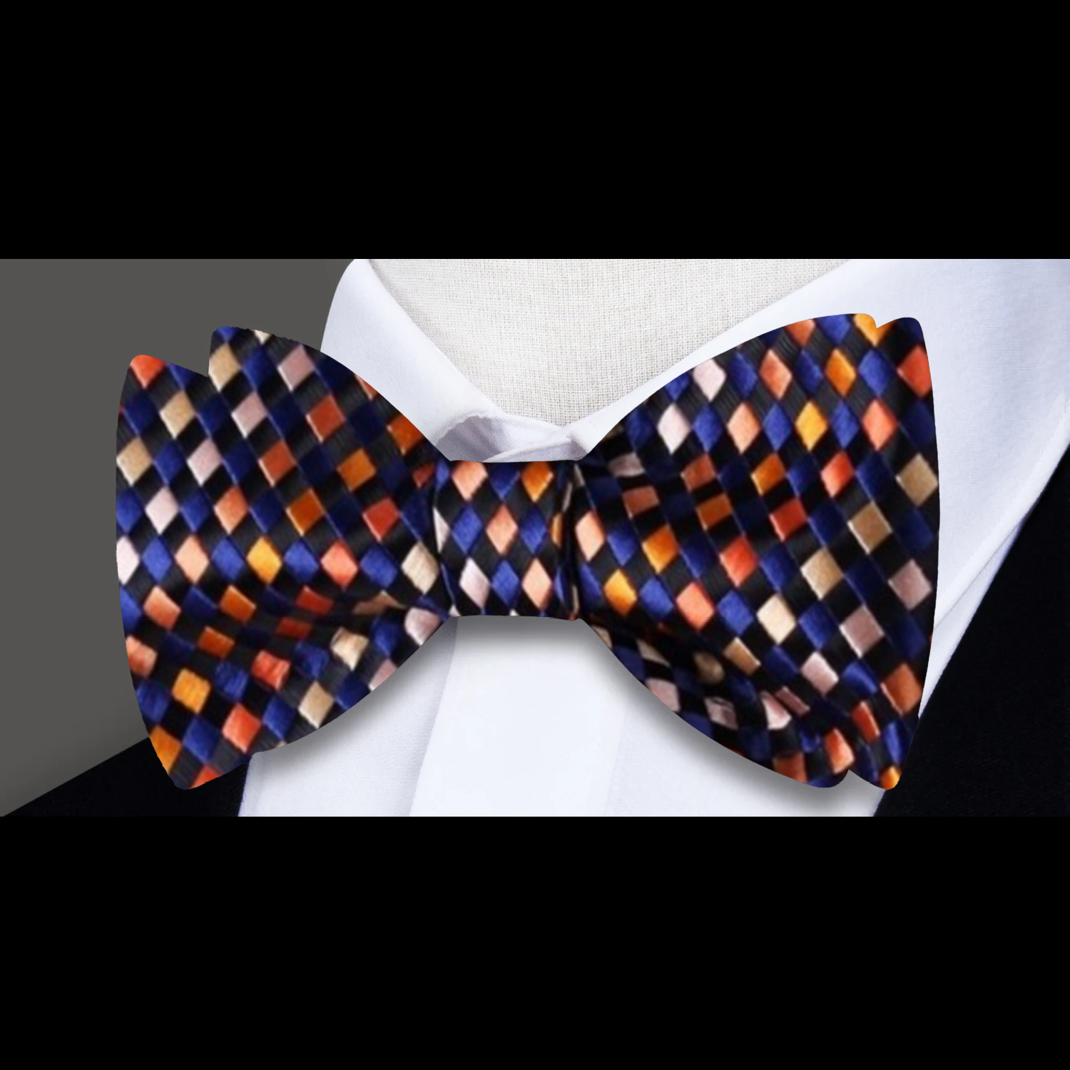Styled with a white dress shirt and navy blazer for a formal look