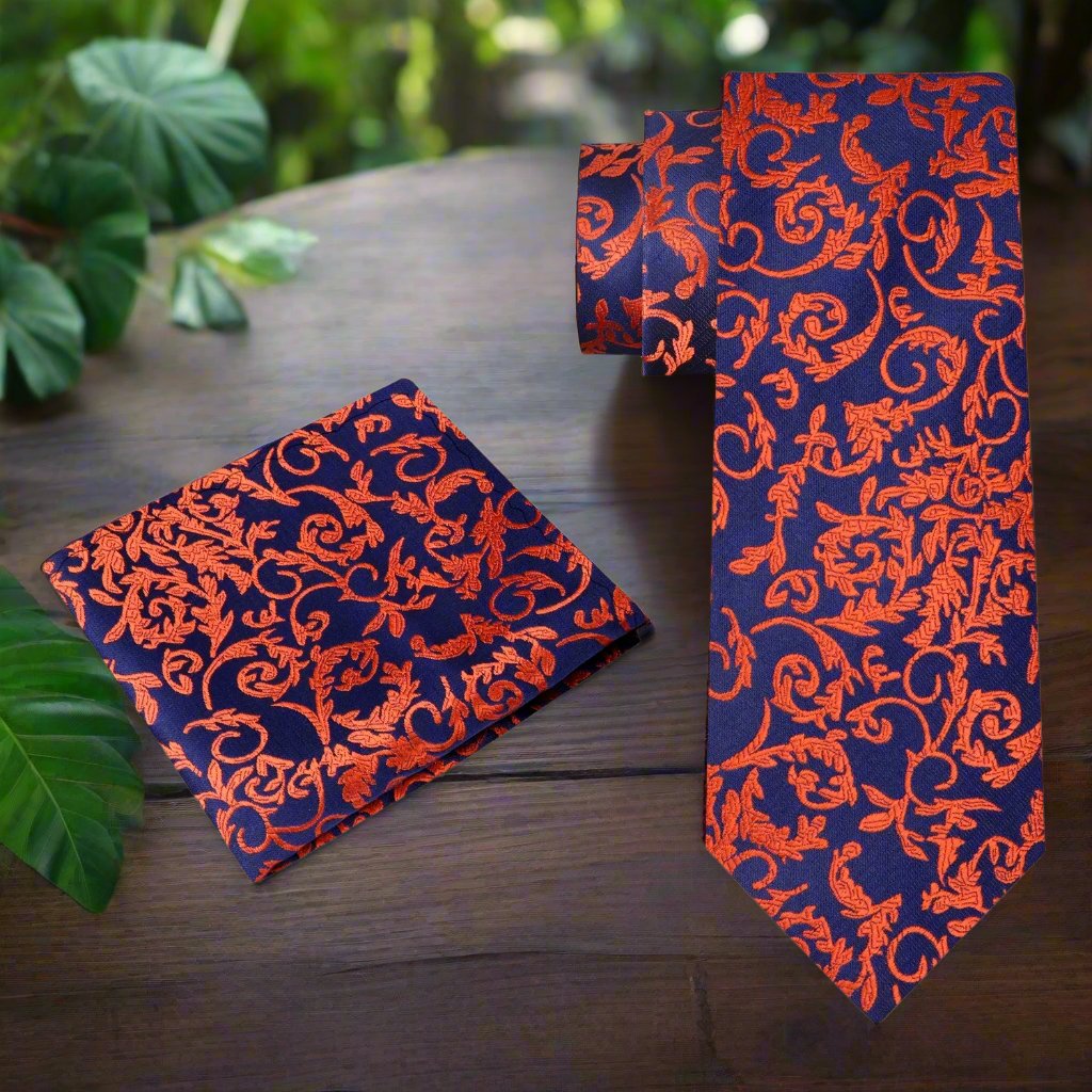 Elegant necktie with orange vine design, showcasing sophisticated style.