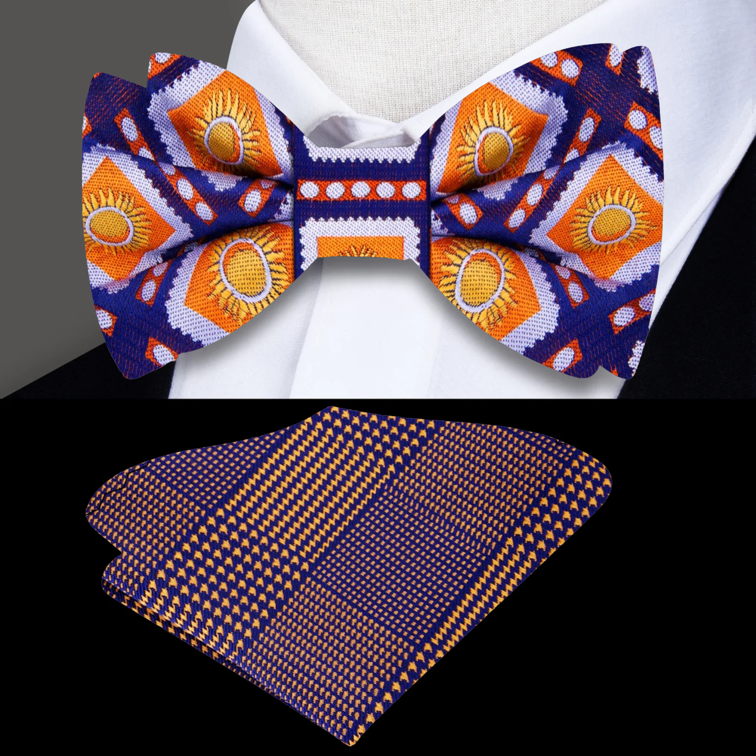 Close-up of a dark blue and orange geometric sunburst bow tie showing intricate pattern