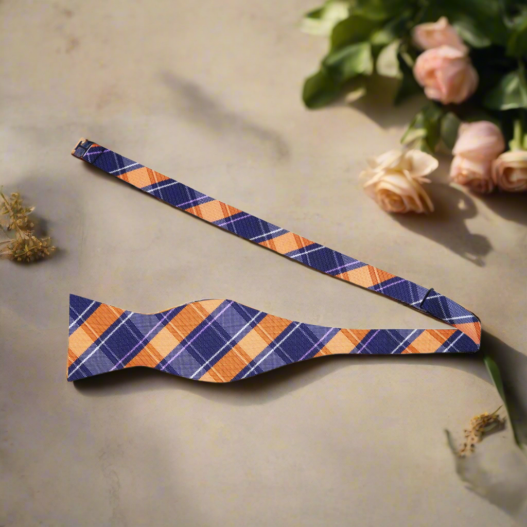 Close-up of a stylish mens plaid bow tie with a self-tie knot, perfect for weddings