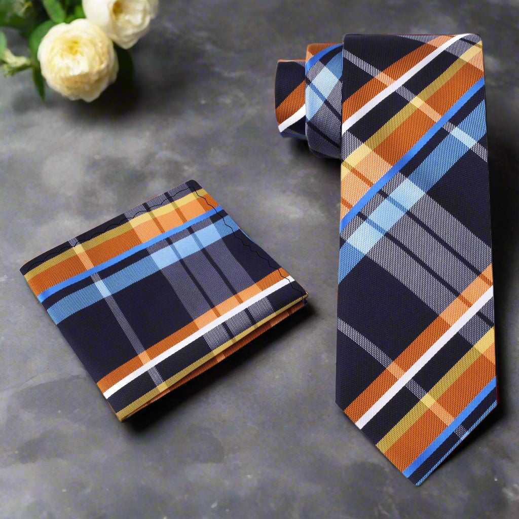 Plaid necktie styled with a white dress shirt and navy suit, perfect for a business casual look.
