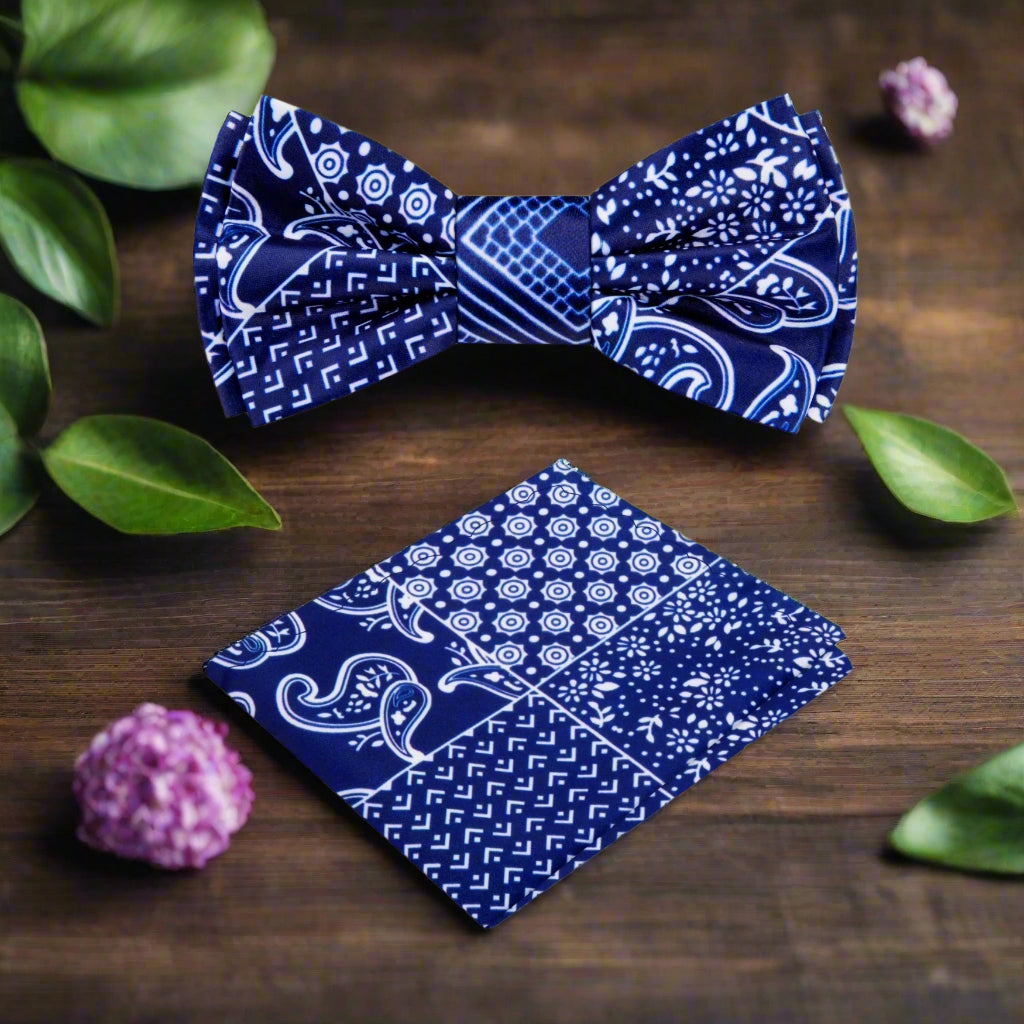 Pre-tied bow tie featuring a patchwork paisley design, elegantly displayed with a formal shirt.