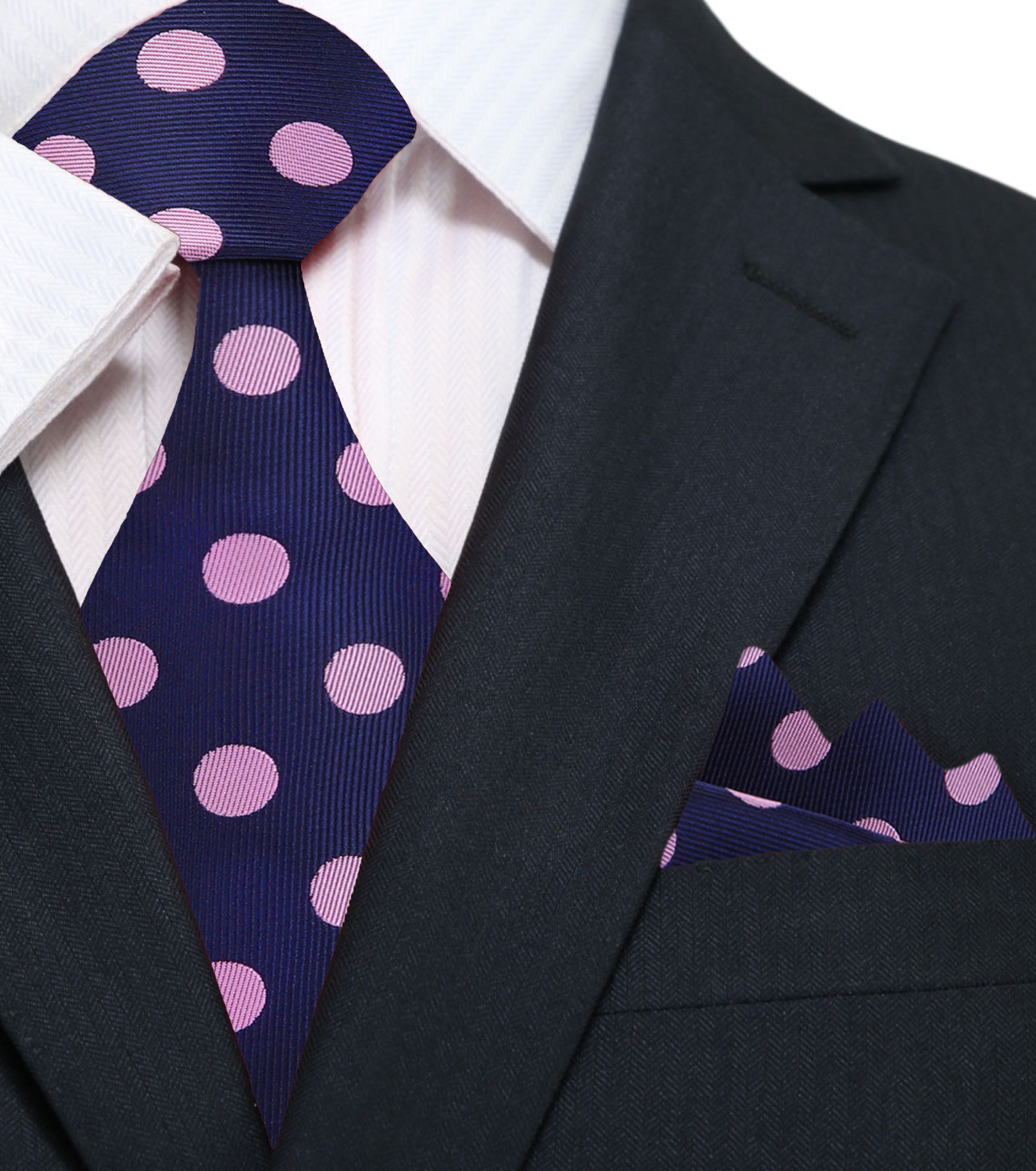 Model wearing a light blue dress shirt paired with a polka dot tie, ideal for the office.