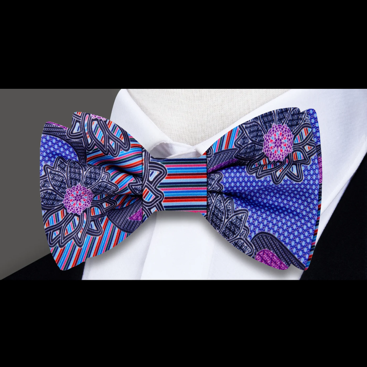 Vibrant silk bow tie with blue and purple flower pattern, ideal for weddings.