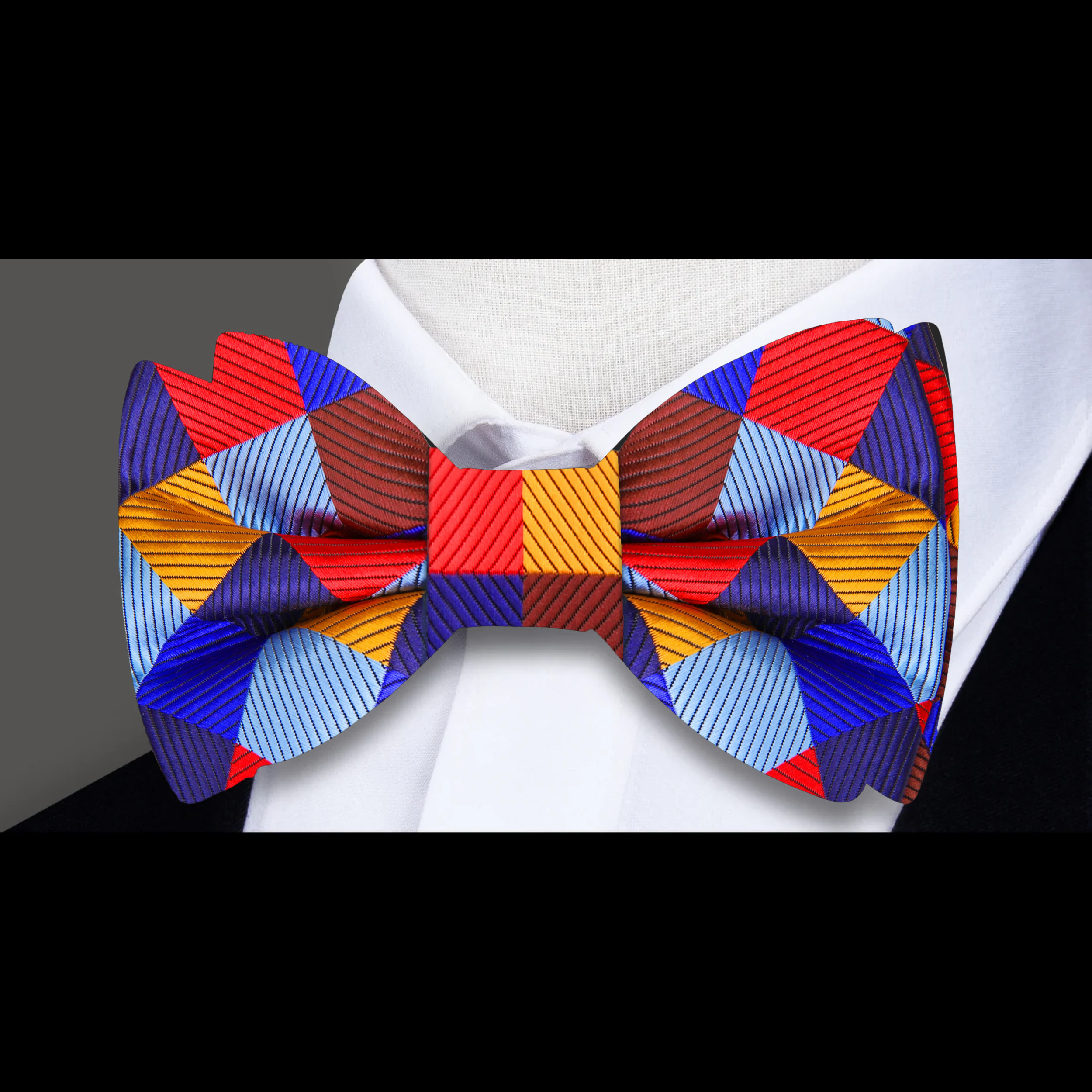 Close-up of vibrant multicolored plaid silk bow tie for weddings
