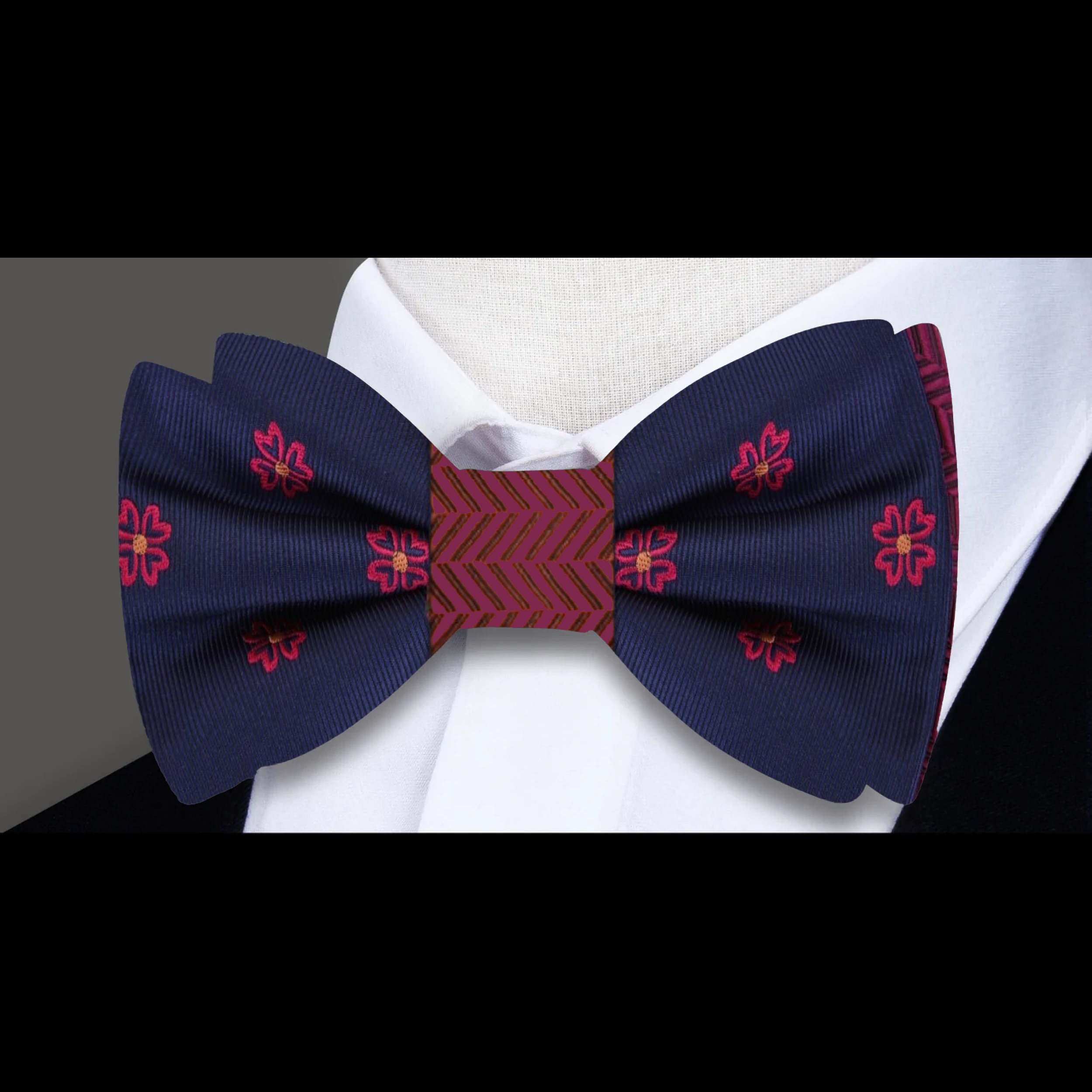 Model wearing the double-sided bow tie, paired with a white dress shirt at a formal event.