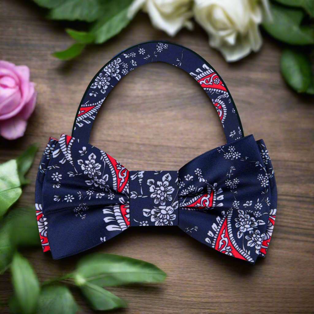 Front view of handmade patriotic paisley silk bow tie in deep blue and red