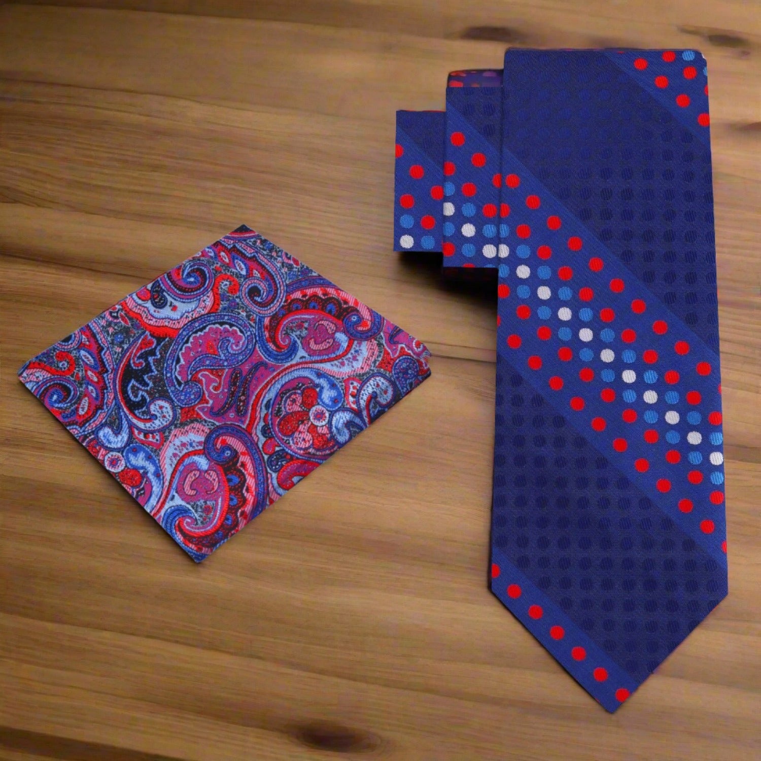 Front view of stylish polka dot silk tie in red and blue for men