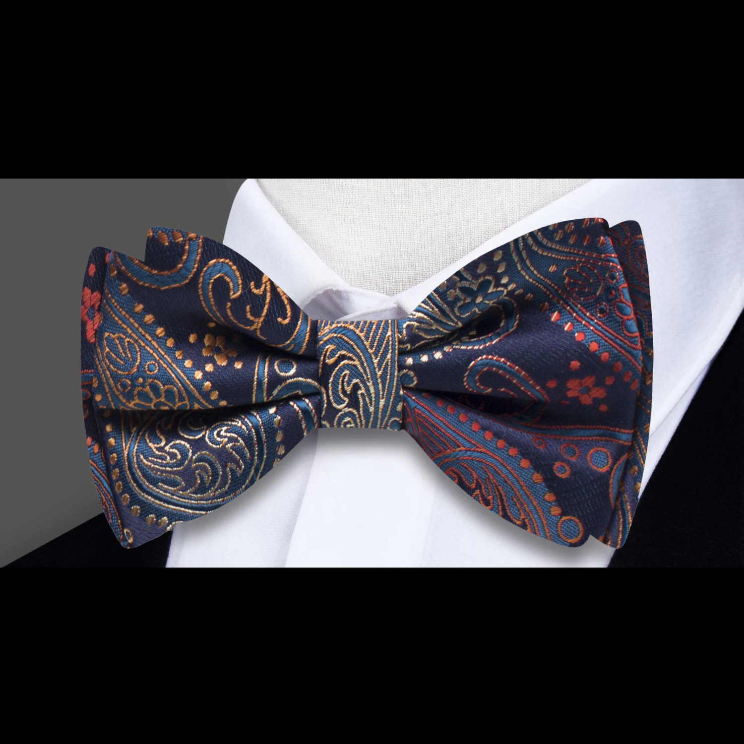Elegant paisley silk bow tie worn with a white dress shirt for a wedding