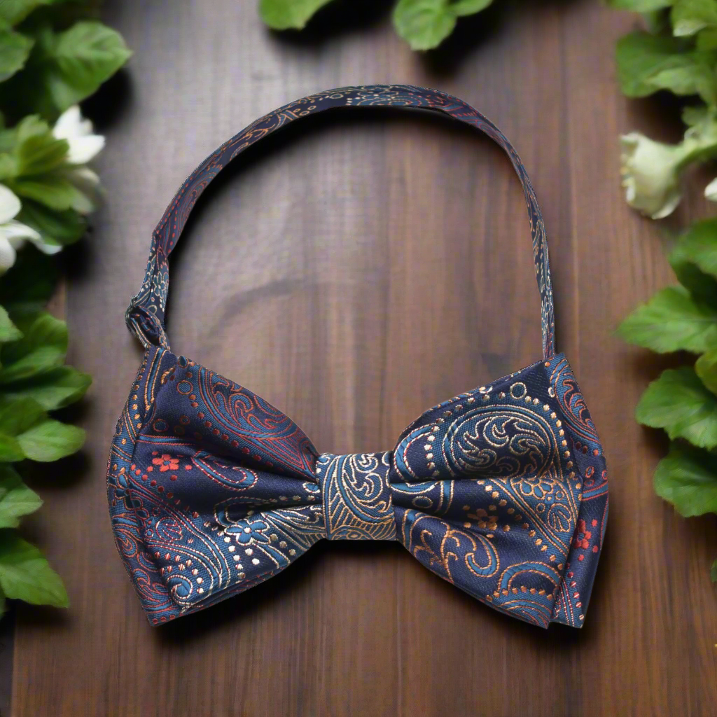 Man adjusting a sophisticated paisley bow tie for a formal event