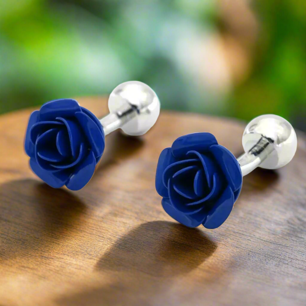 Stylish man wearing rose cufflinks, enhancing his formal outfit.