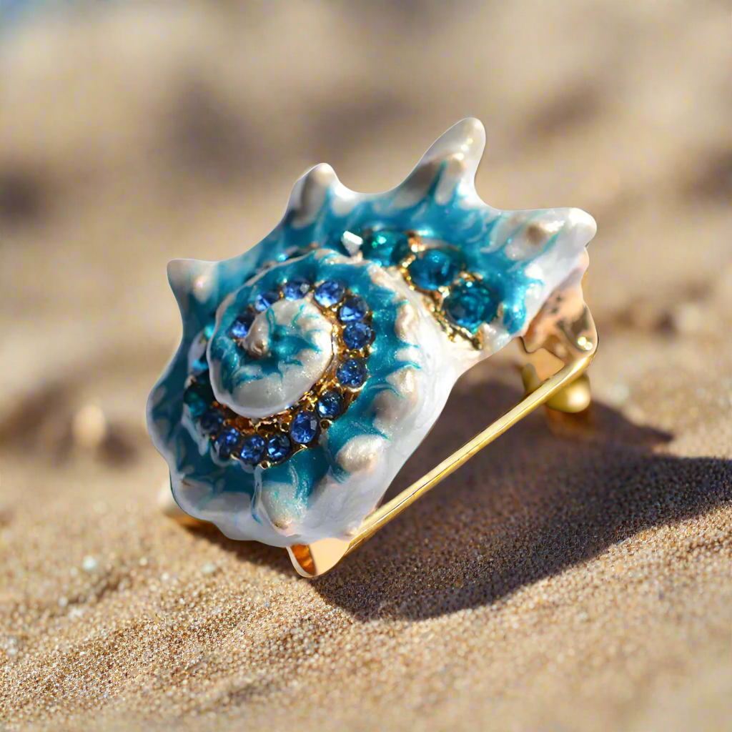 Close-up view of the conch shell lapel pin, showcasing its intricate rhinestone detailing and elegant design.