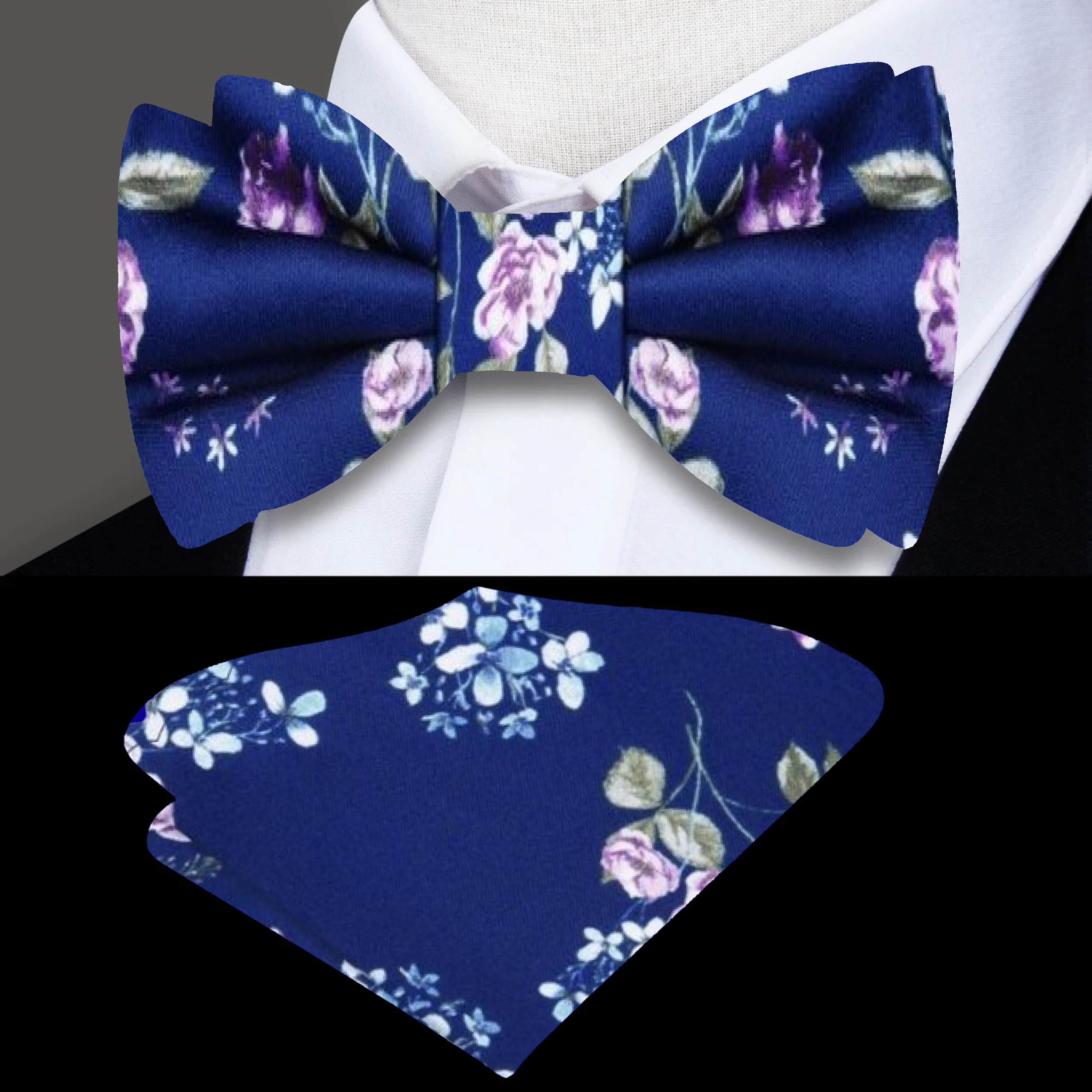Close-up of silk floral bow tie in stormy gray with green and purple accents