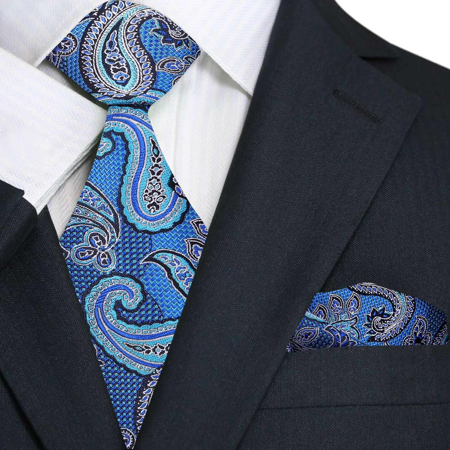 Close-up of the red paisley necktie showcasing intricate patterns and rich colors