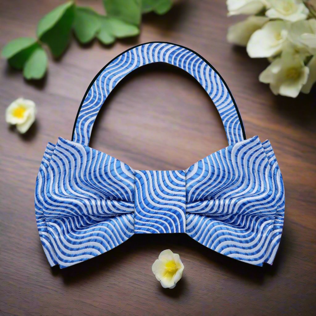 Azure Waves bow tie featuring wavy lines pattern in shades of blue, perfect for formal occasions.