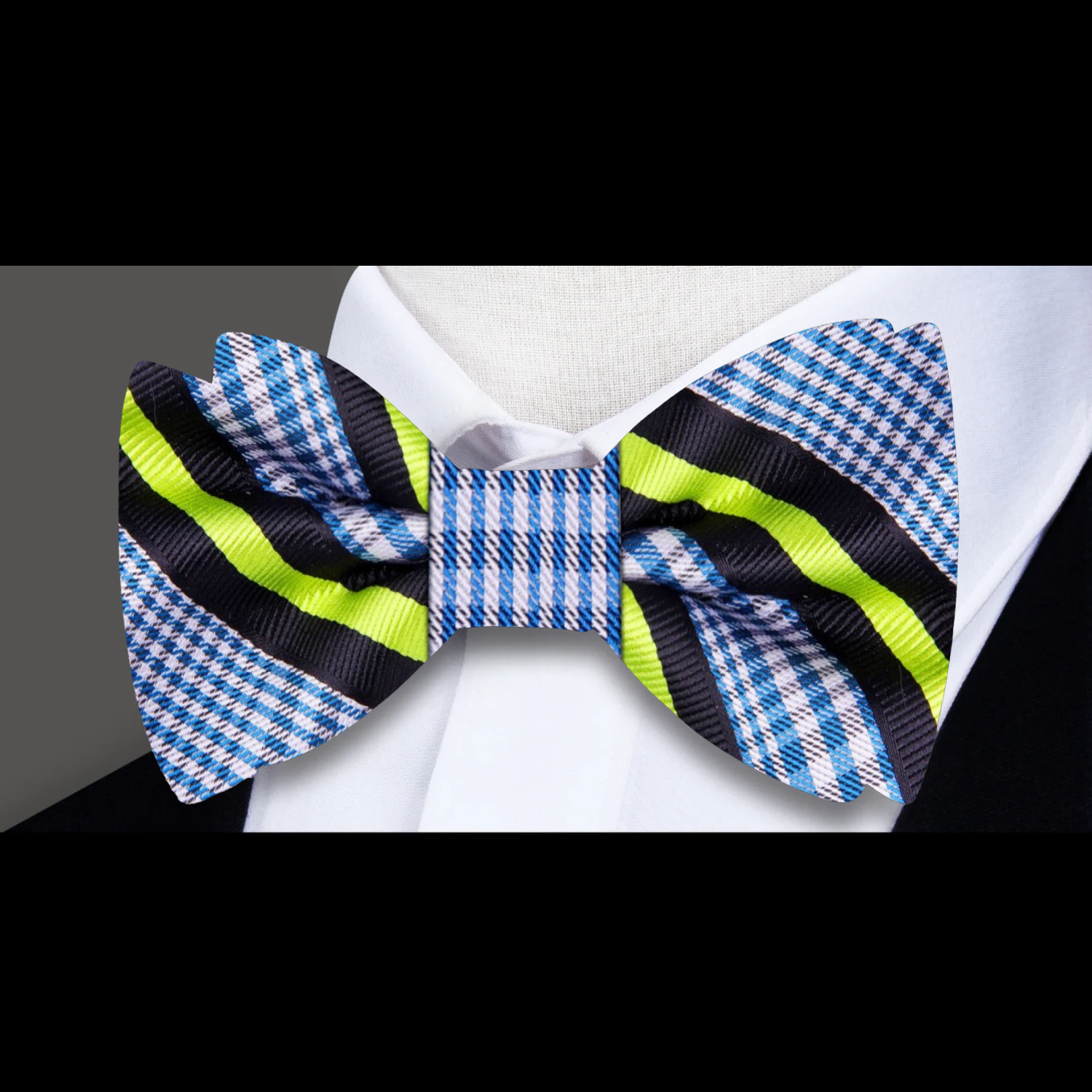 Vibrant Blue Plaid Bow Tie styled with a light blue dress shirt, perfect for formal occasions.