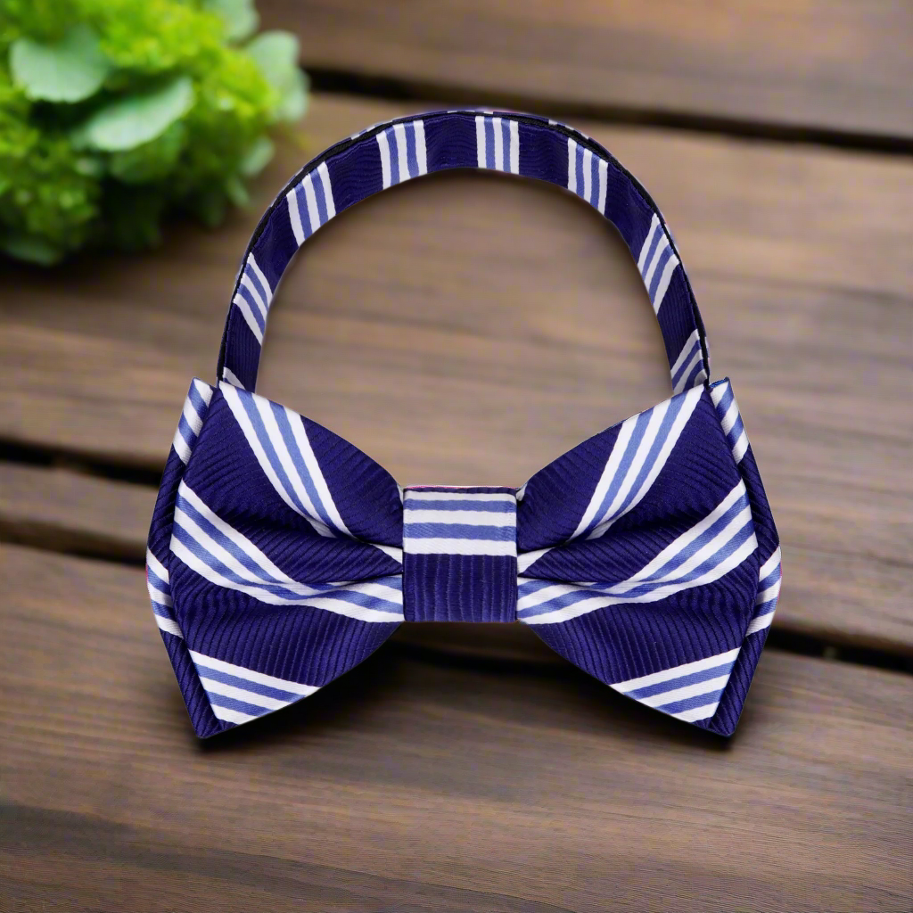 Close-up of navy blue silk striped bow tie for men, perfect for weddings