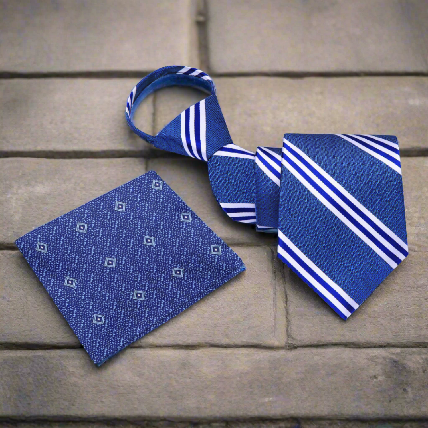 Close-up of the Double Play Stripe Necktie showcasing its luxurious silk fabric and design.