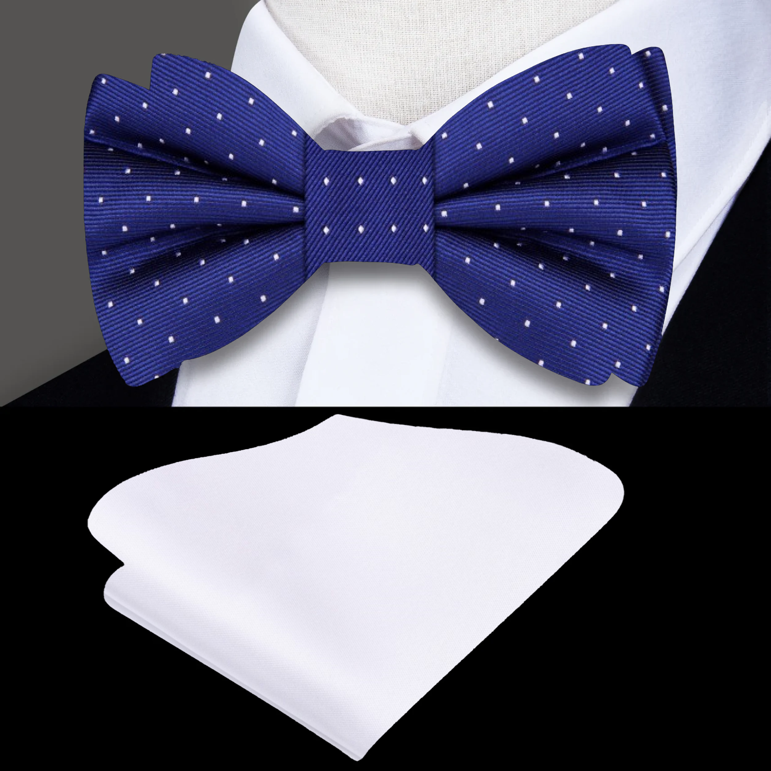 Close-up of navy silk polka dot bow tie with matching pocket square, styled on a white dress shirt