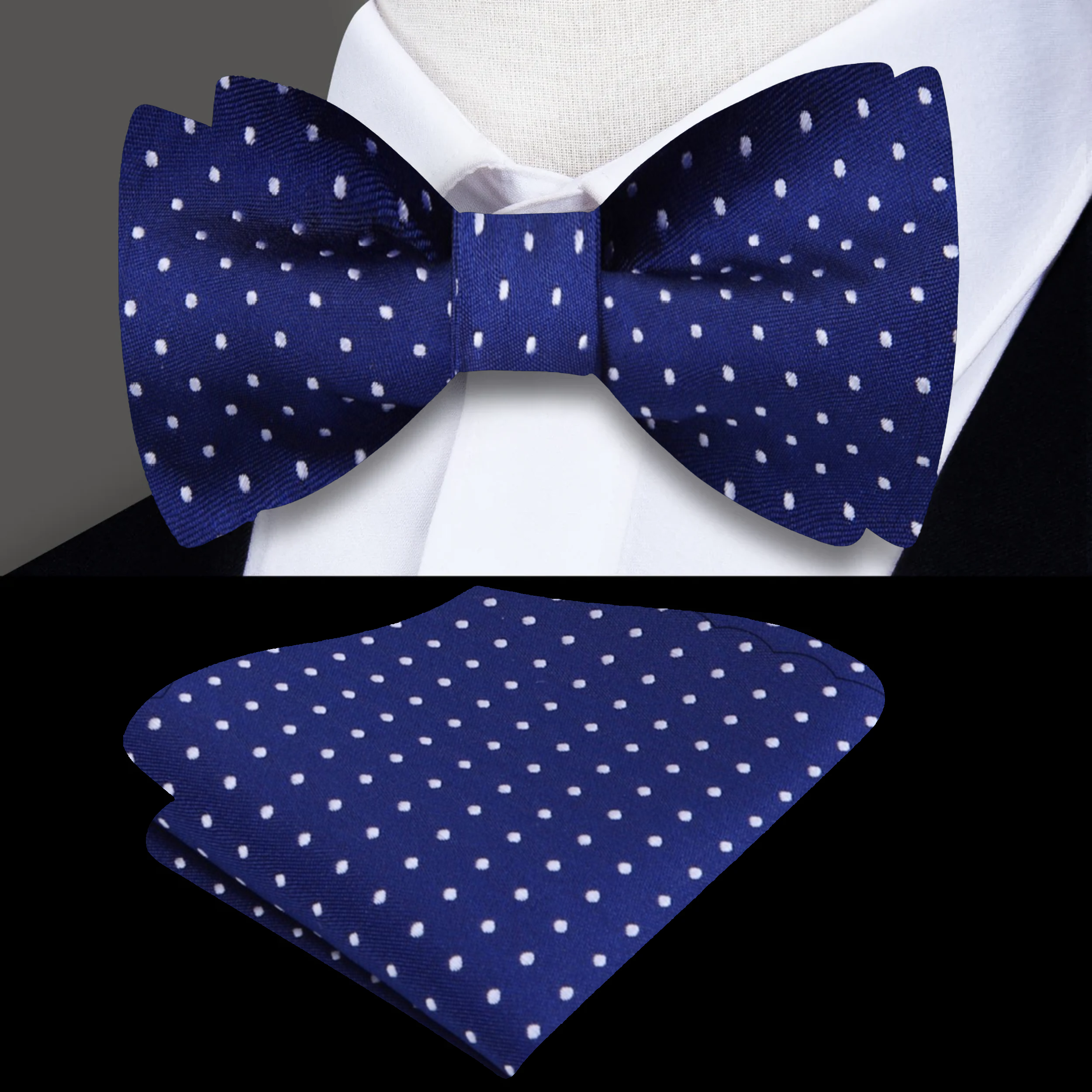 Elegant microdot silk bow tie in dark blue, showcasing its refined texture and playful design.