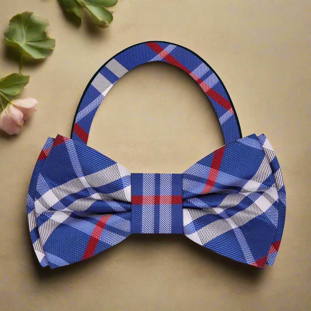 Close-up of the Blue, White, and Red Plaid Silk Bow Tie showcasing its texture and pattern.