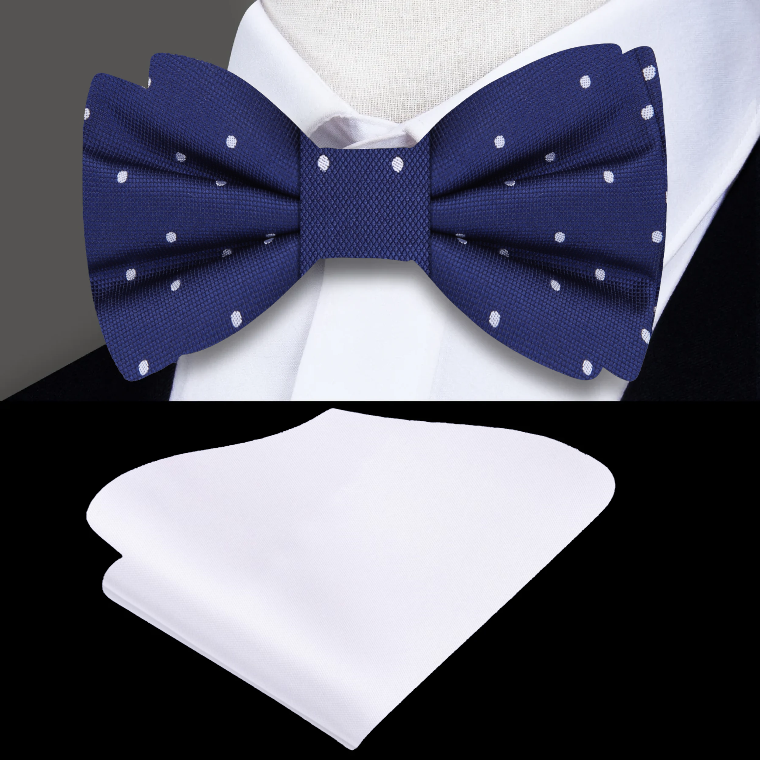 Close-up of the charming dark blue silk bow tie with white polka dots, perfect for business events.
