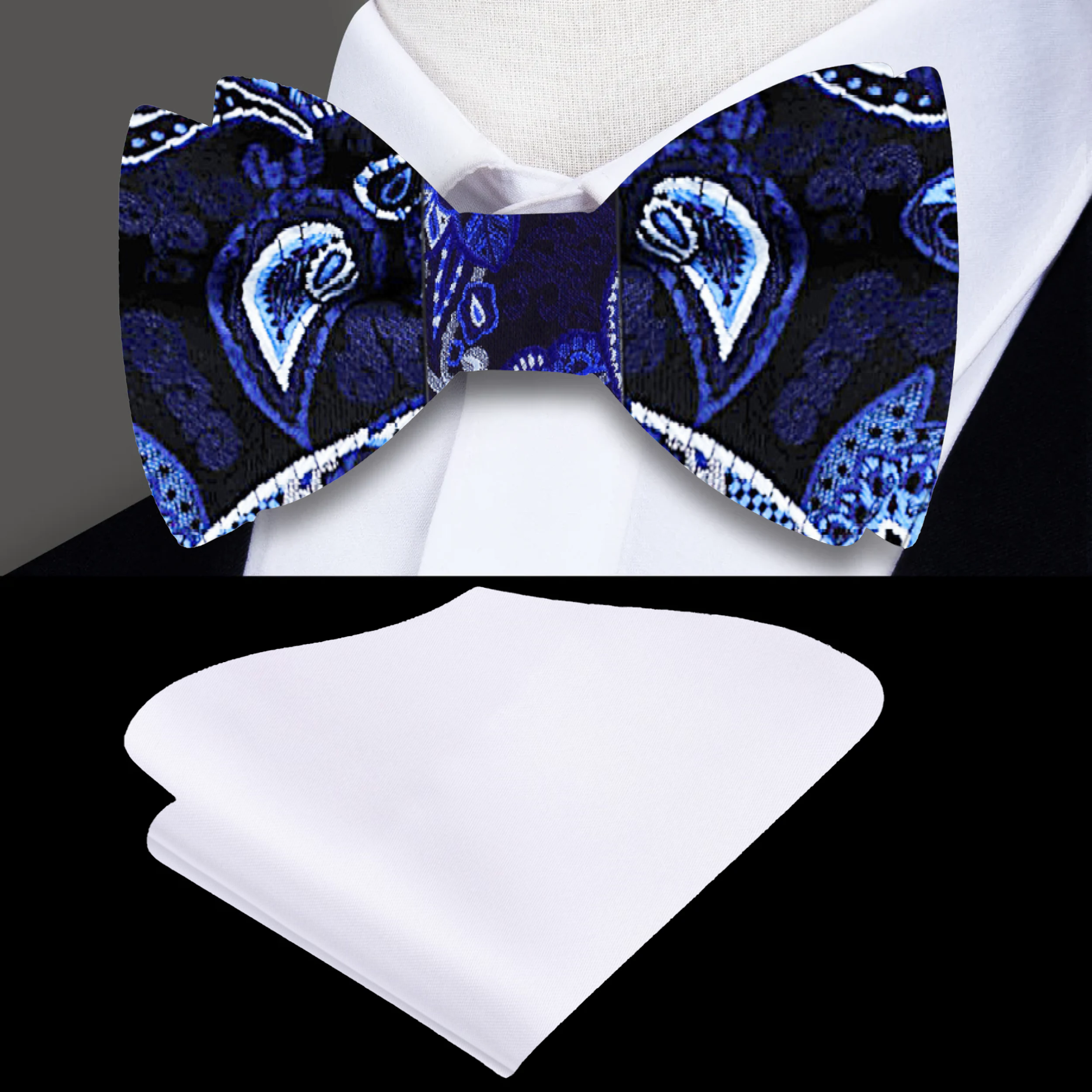 Close-up of Norchester blue paisley bow tie showing intricate silk texture and self-tie design