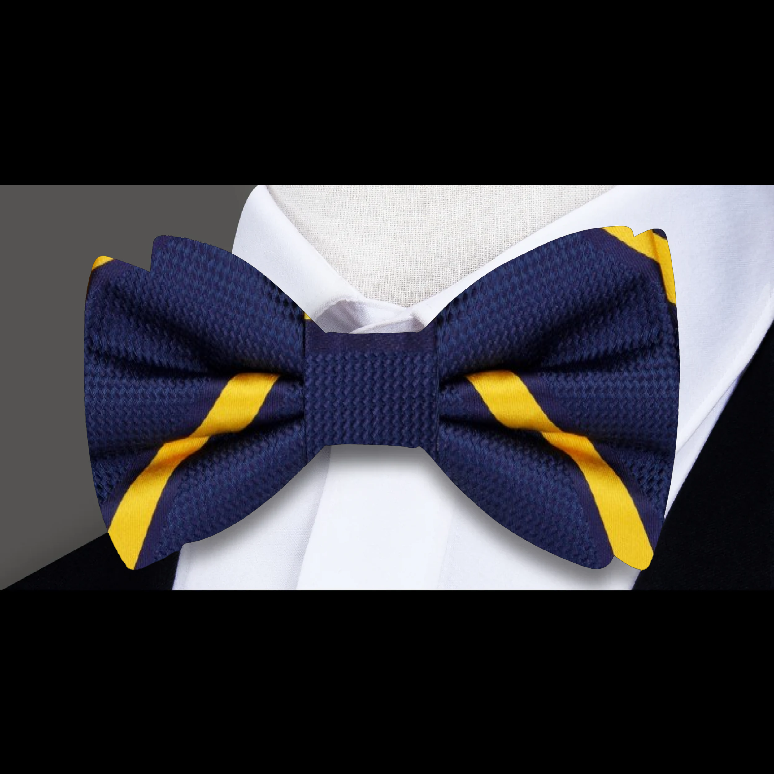 Detailed shot of the bow ties stripe pattern and high-quality silk fabric