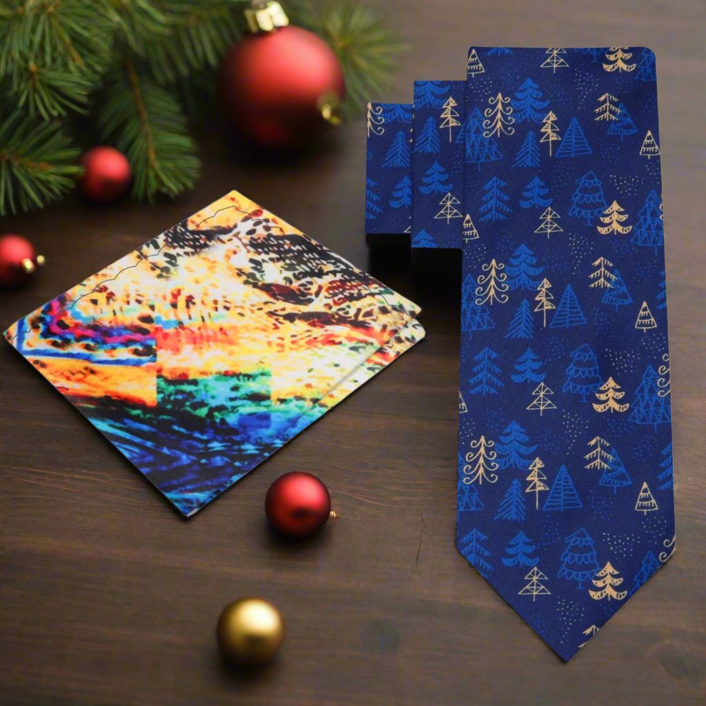 Blue and gold Christmas Forest necktie with pocket square on a formal shirt