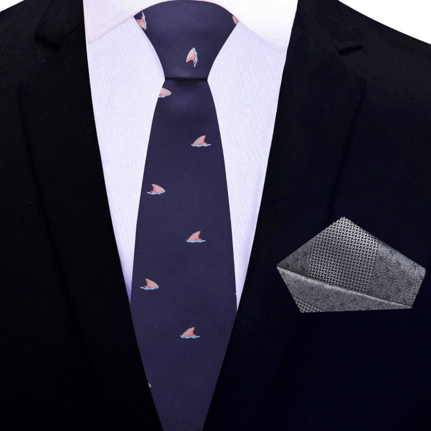 Model wearing shark fins necktie with a light grey dress shirt, perfect for casual office settings.