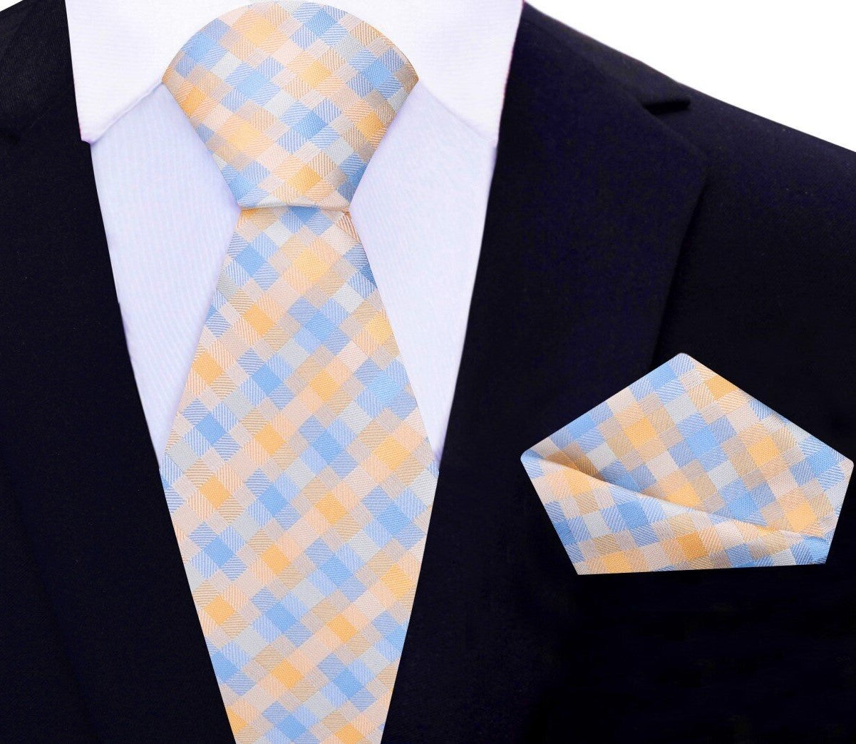 Close-up of vibrant modern plaid silk necktie in orange and light blue for mens fashion
