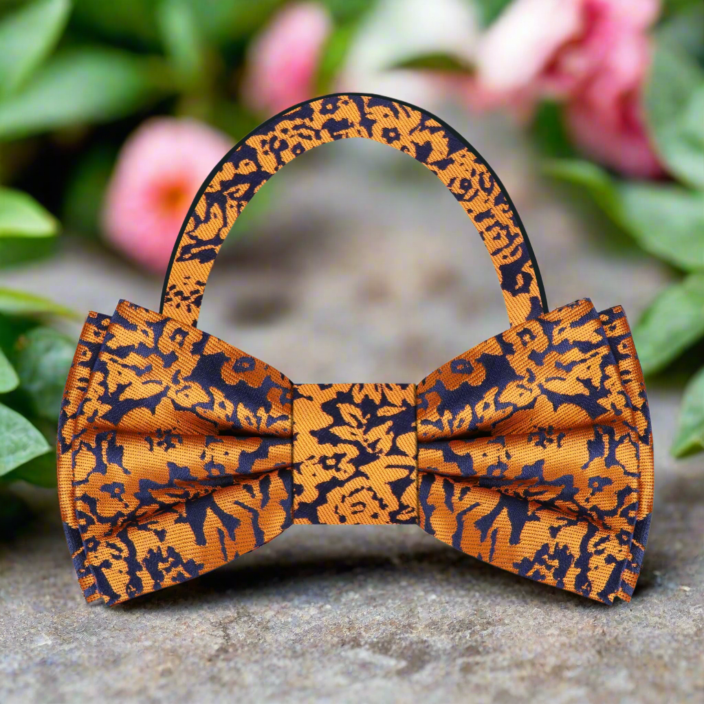 Man wearing the Artistic Floral Elegance Bow Tie with a light blue dress shirt, demonstrating its stylish versatility.