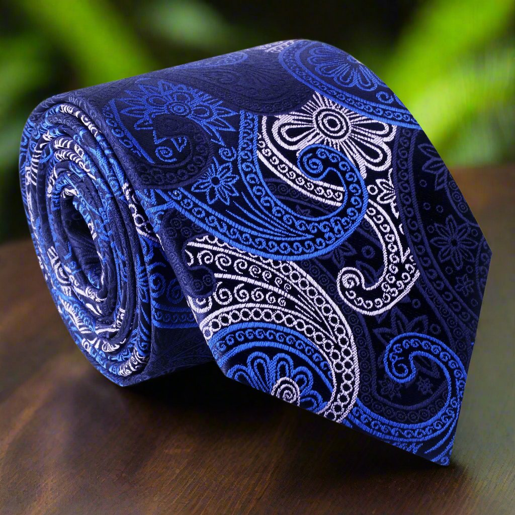 Close-up of the Sophisticated Blue Paisley Necktie for Men, highlighting intricate details and texture.