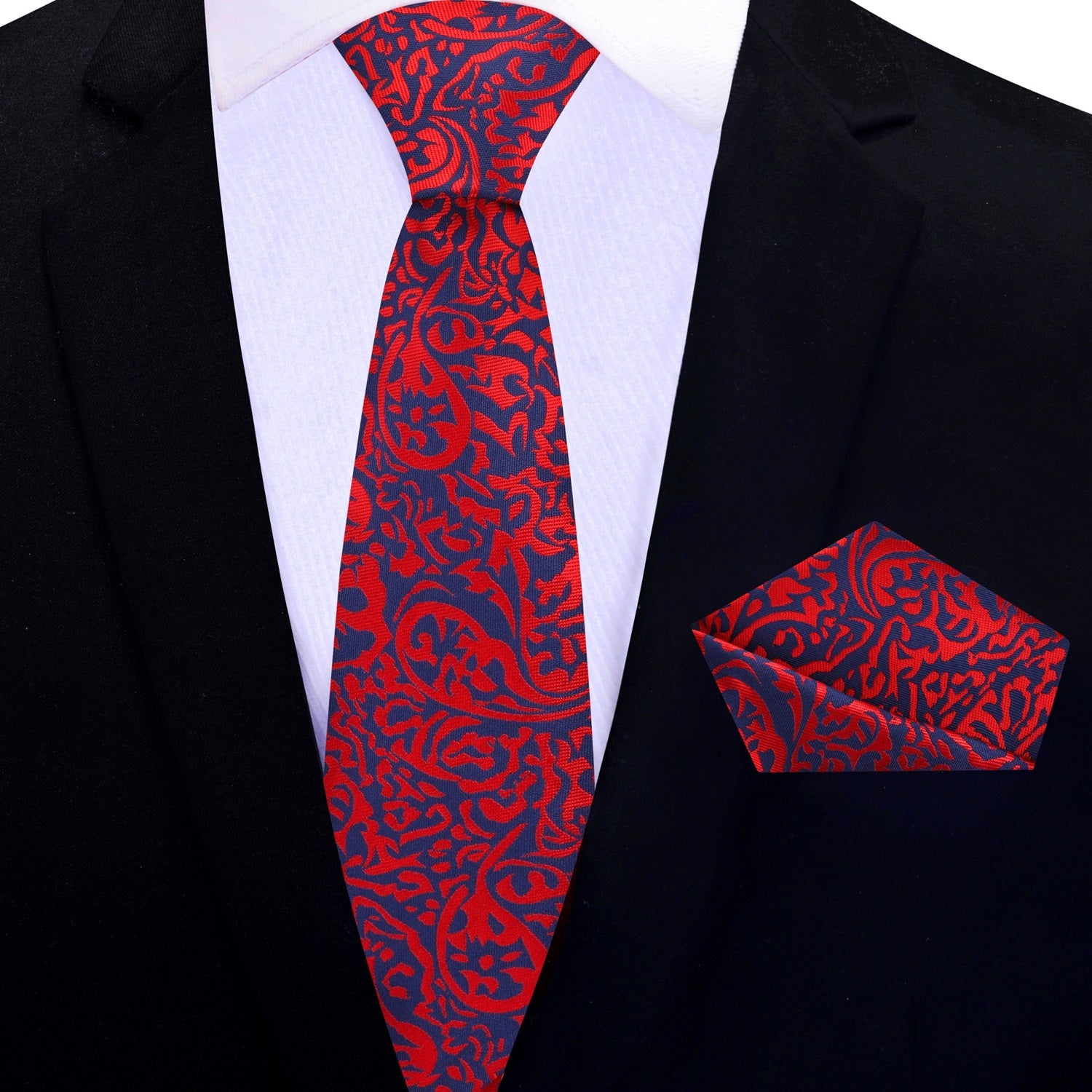 Man wearing a paisley silk necktie with a dark suit for a wedding
