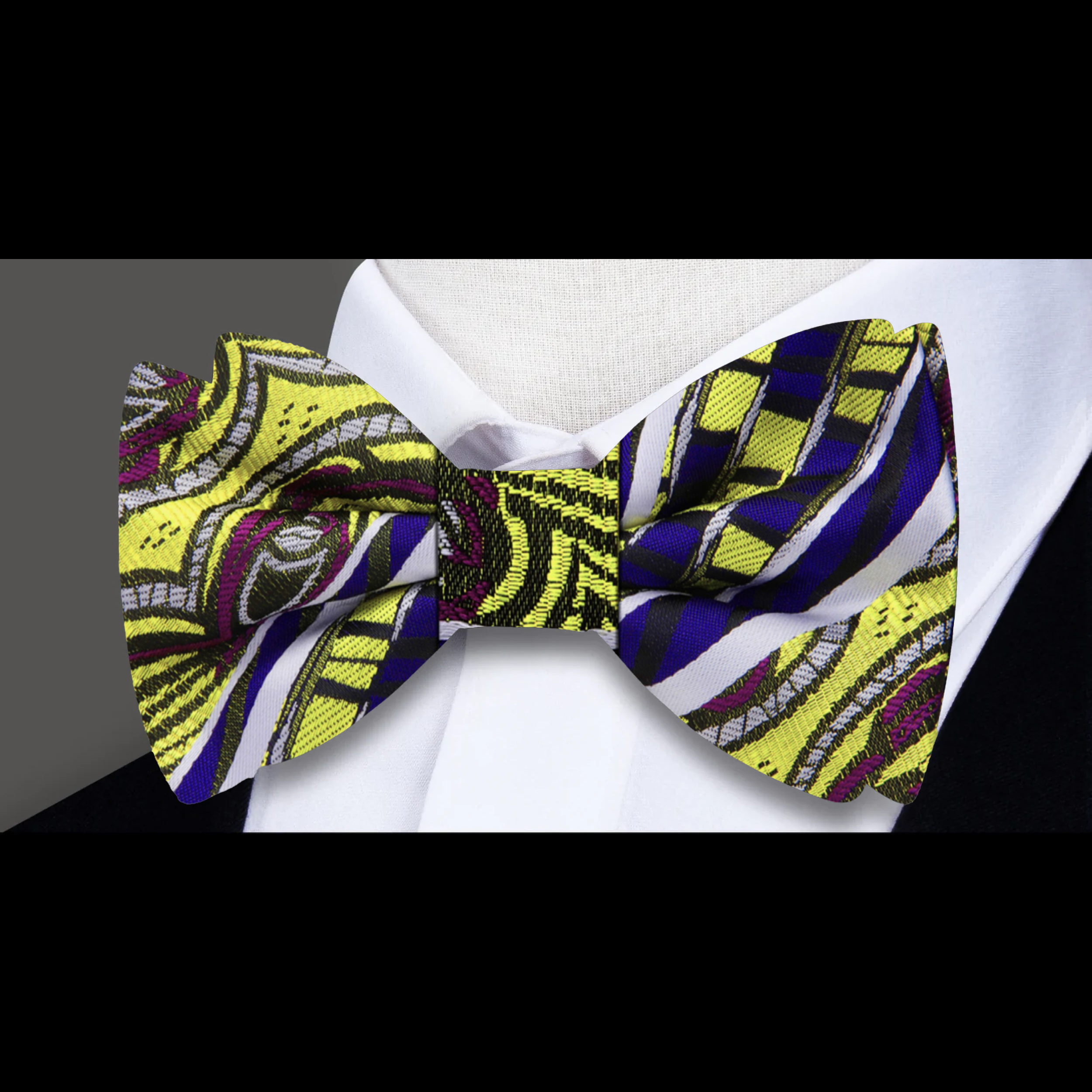 Bright yellow batik bow tie with abstract patterns, perfect for weddings and formal events.