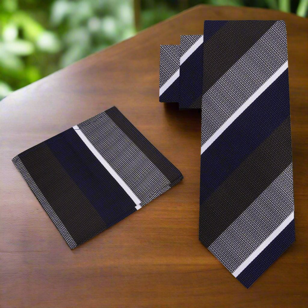 Close-up of silk tie showing navy, olive, and grey striped pattern—ideal for formal ties for business meetings.