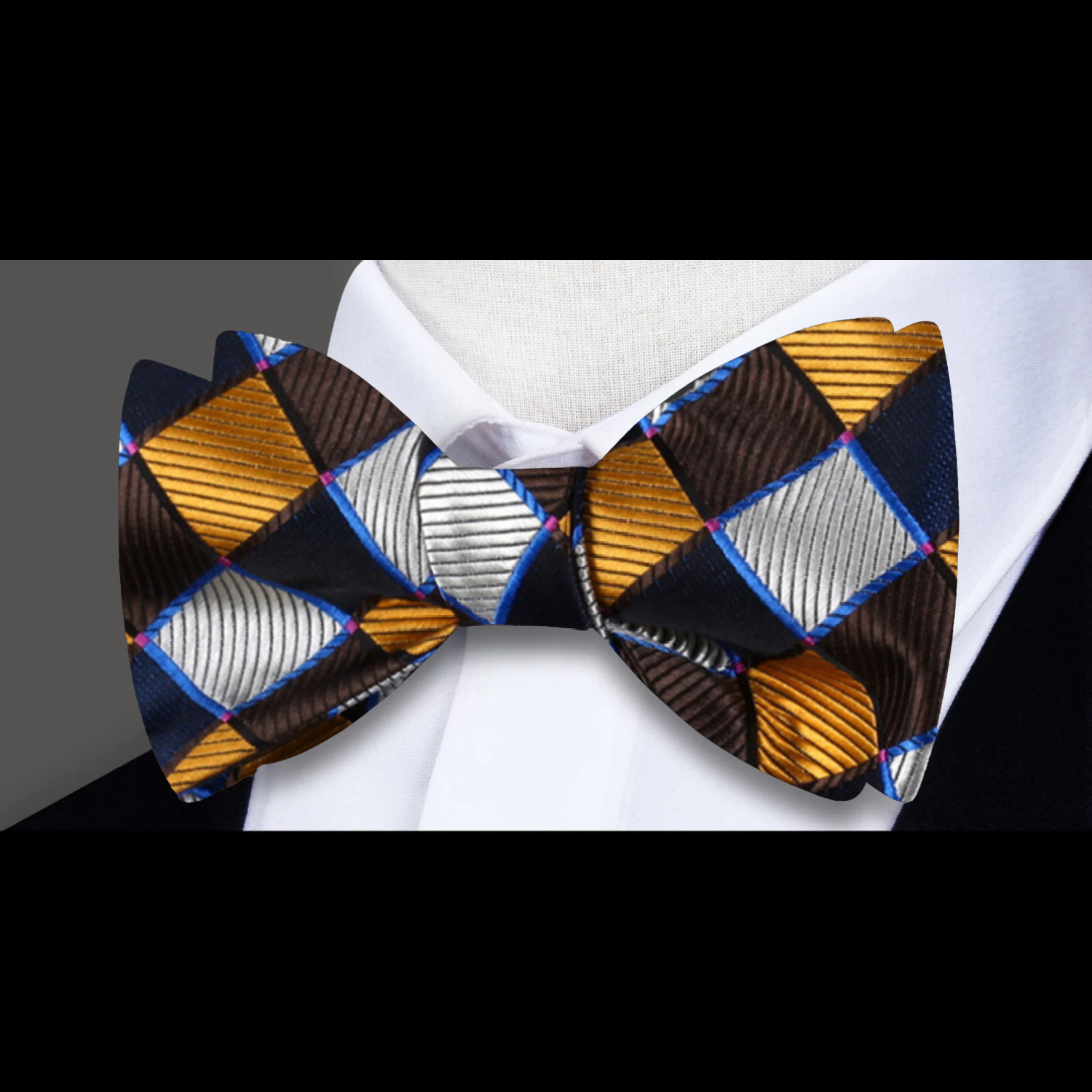 Close-up of the bow ties intricate geometric pattern and silk texture