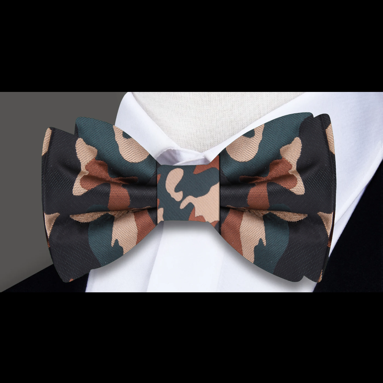 Man adjusting self-tie camouflage bow tie for a formal event