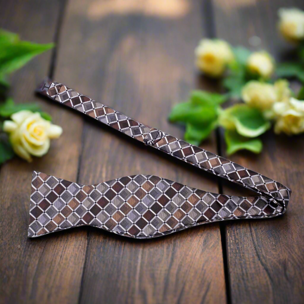 Close-up of the geometric pattern silk bow tie, showcasing vibrant colors and fine details