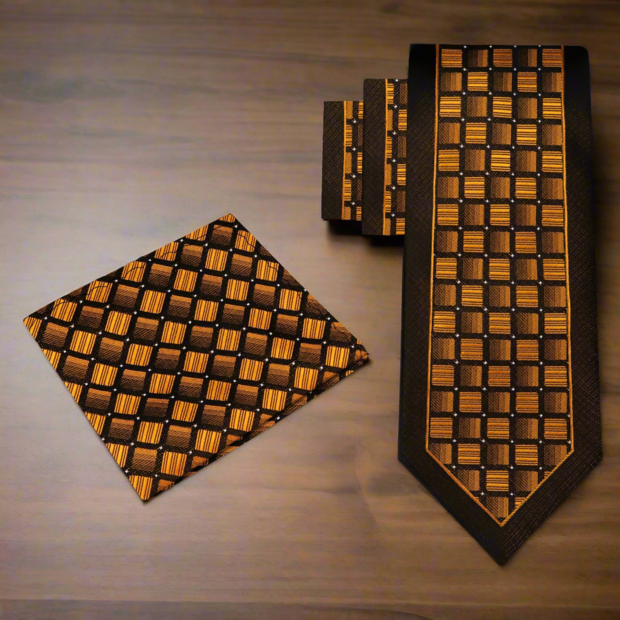 Vivid geometric silk necktie in golden orange and brown on a dress shirt for formal occasions
