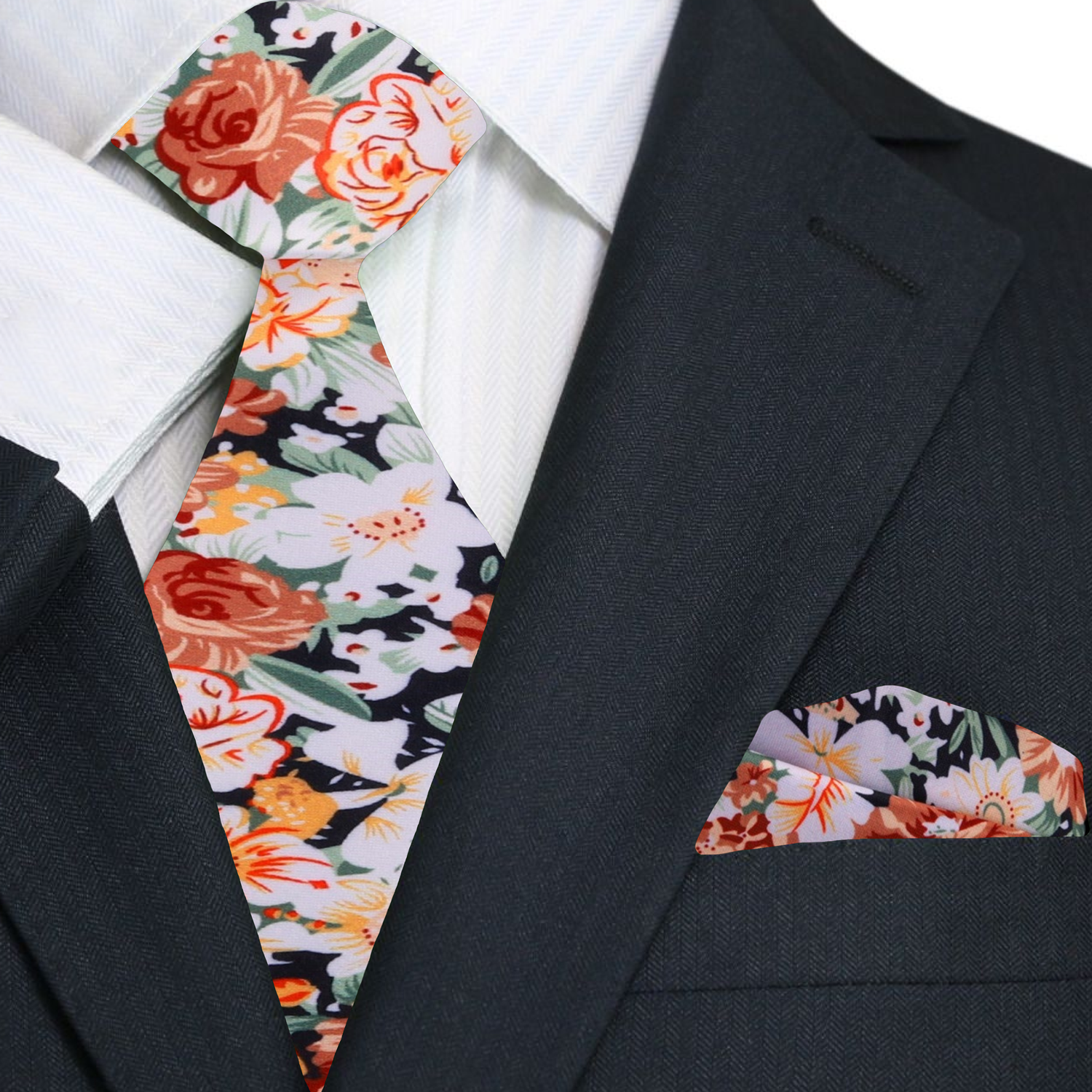 Model wearing hand-drawn floral tie with green suit at outdoor wedding