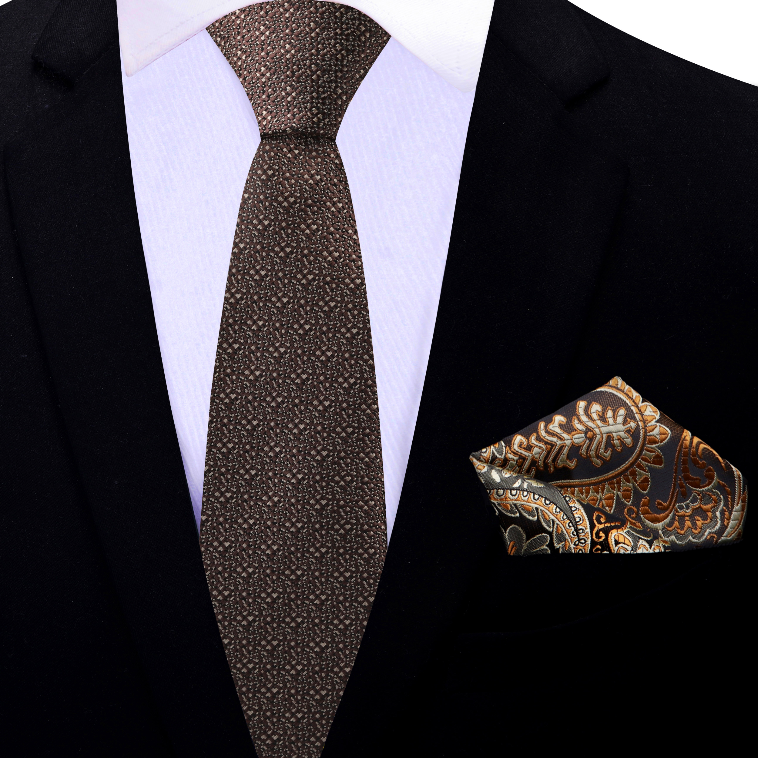 Dark brown necktie paired with a charcoal suit, ideal for business meetings and formal events.