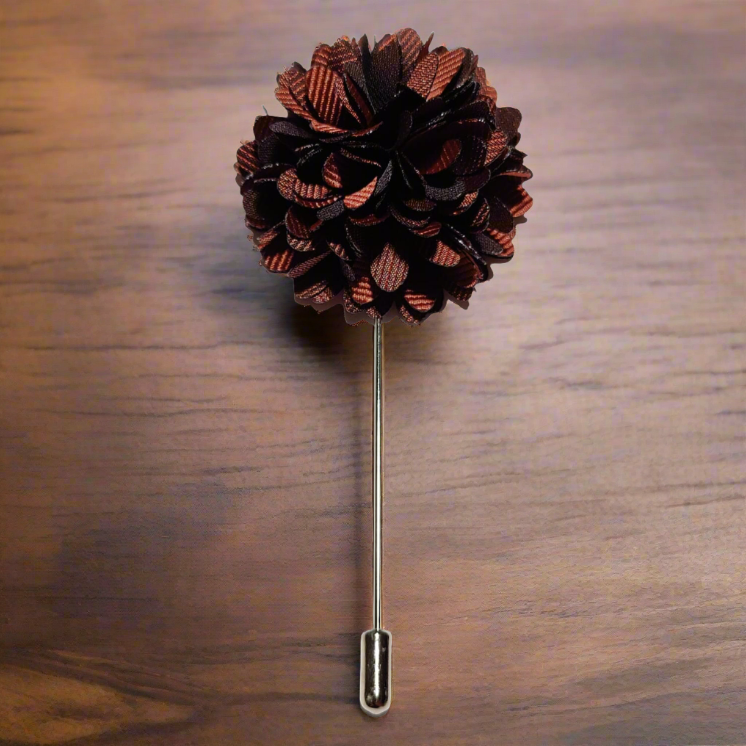 A close-up of the Regal Blossom lapel pin on a classic suit, highlighting its elegance.