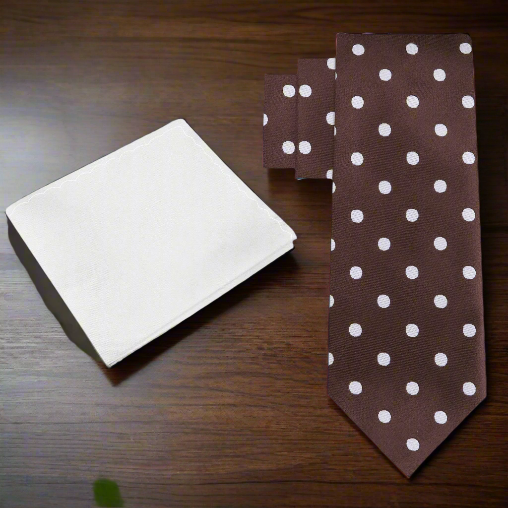 Elegant brown polka dot necktie on a formal dress shirt.