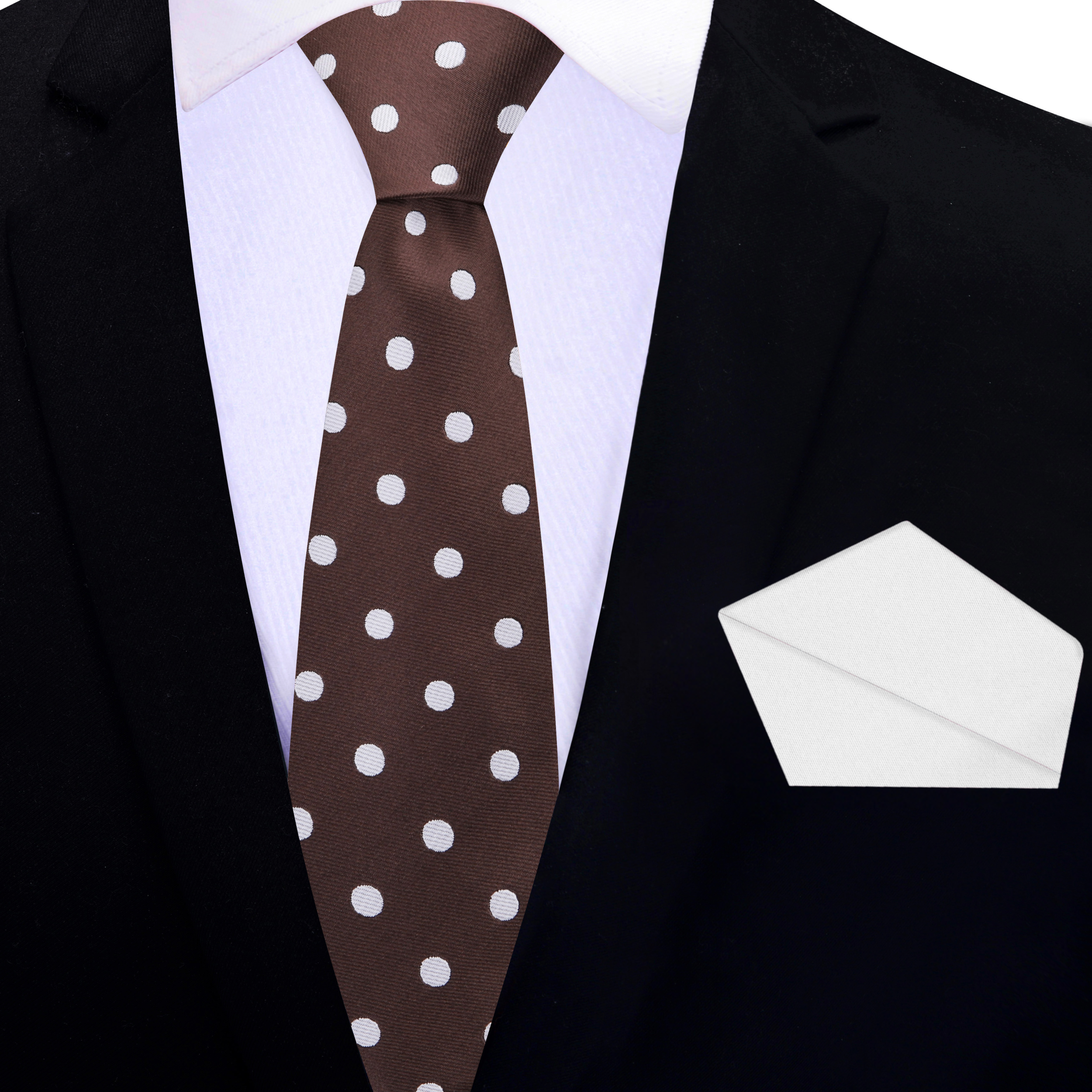 Brown polka dot necktie styled with a navy suit for a wedding.