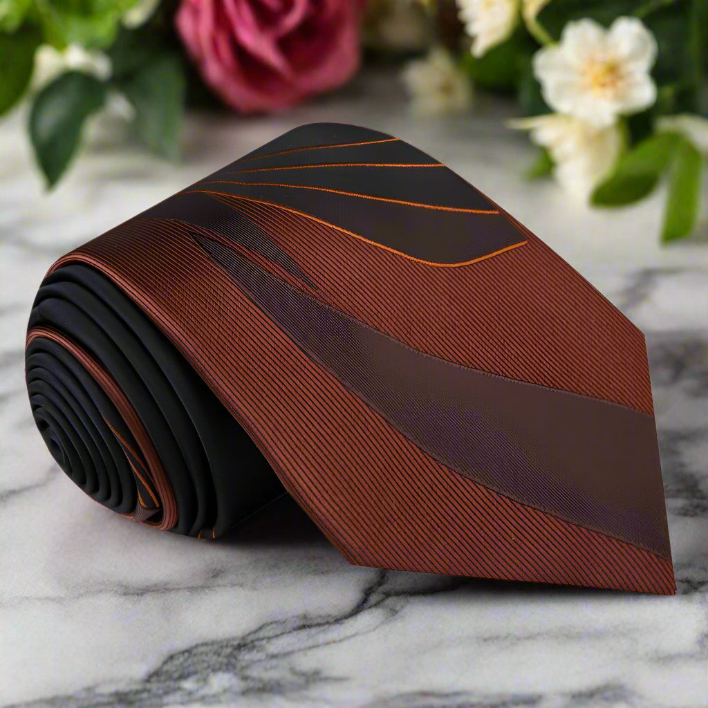 Front view of stylish silk necktie with abstract brown pattern for formal occasions